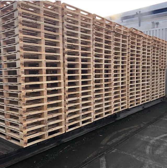 Rows of wooden pallets stacked in a storage area